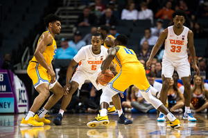 Jalen Carey defends on the ball in SU's ACC Tournament second-round win.